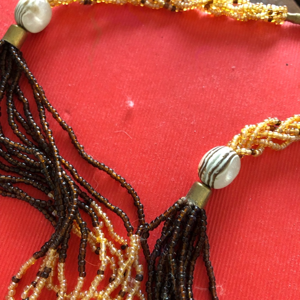 Elegant Beaded Necklace with Gold and Brown Accents